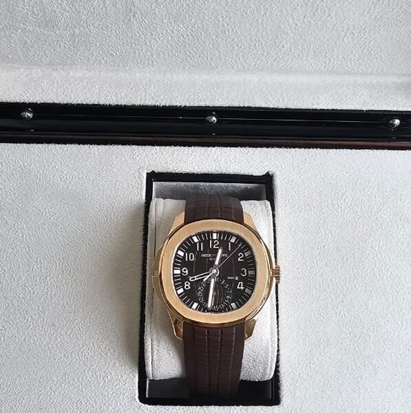 Patek Philippe Aquanaut Travel Time Rose Gold Brown Dial